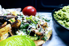Prawn-and-homemade-tostadas-with-guacamole-cotija-and-sprouts